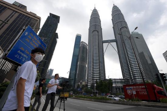 马来西亚对所有归国公民实施14天强制隔离医学观察